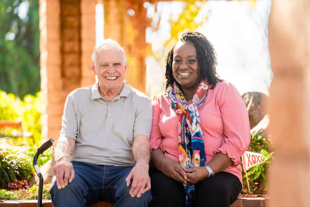woman sitting with older man
