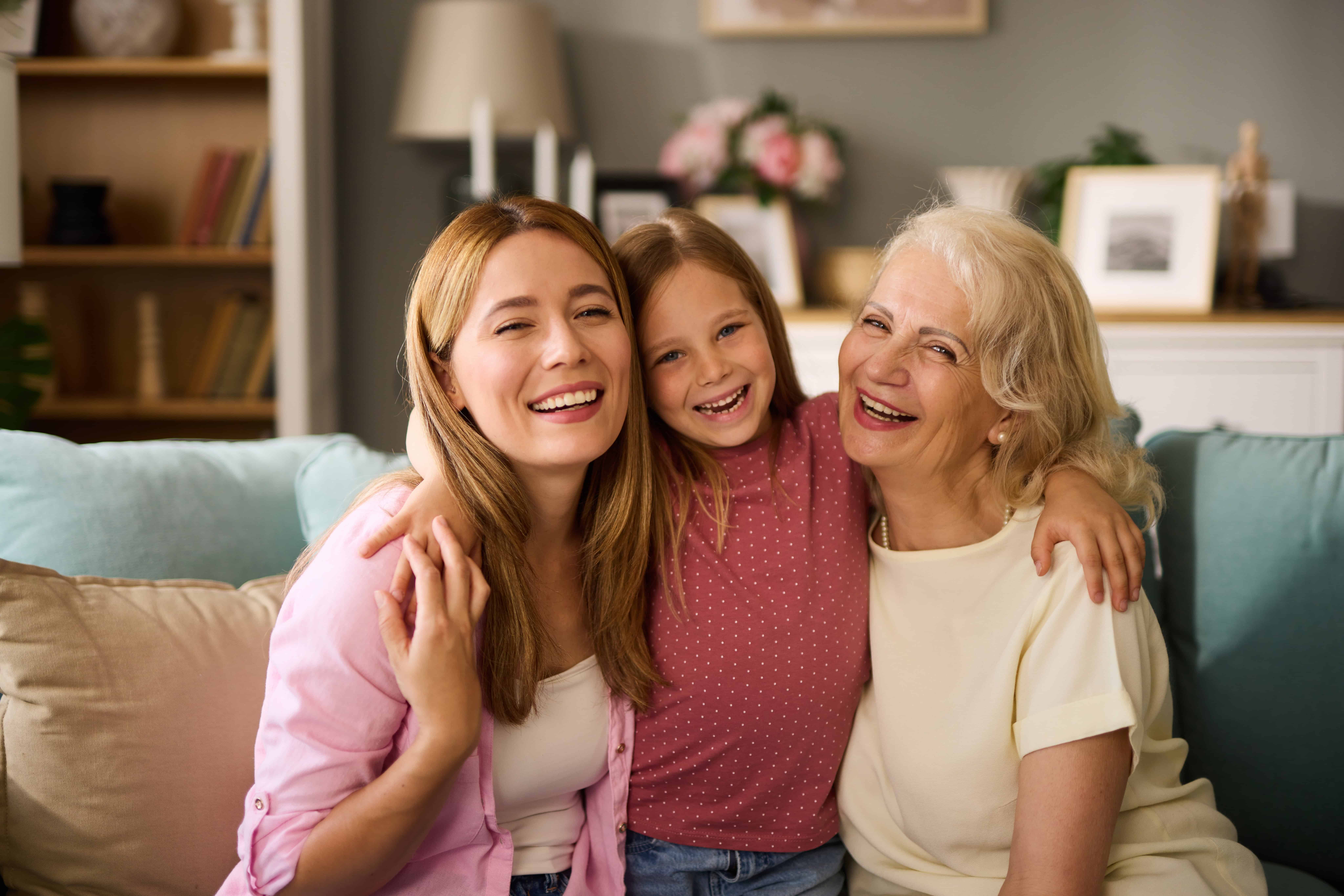 three generations of women happy smiling