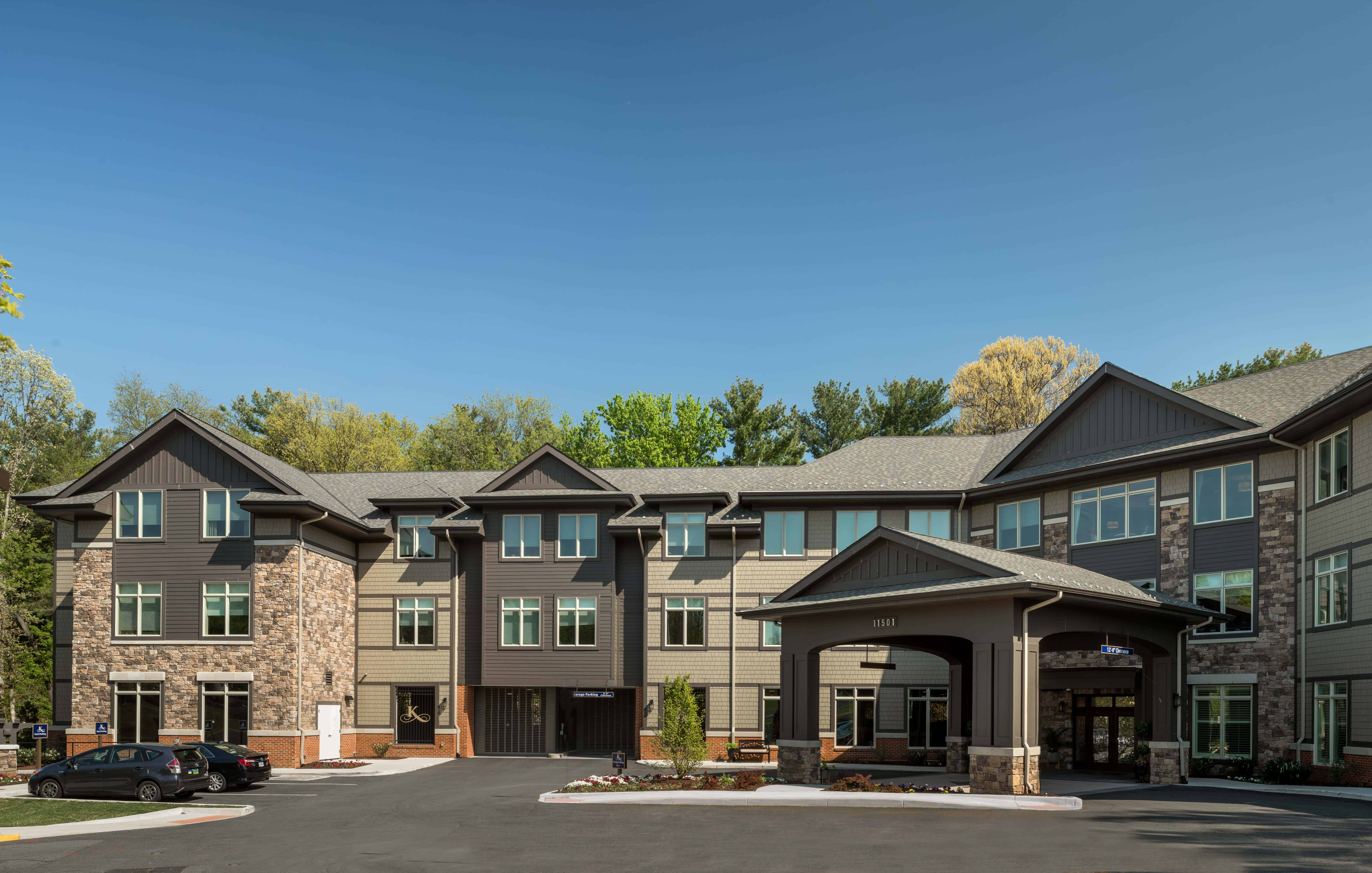 The Kensington Reston entryway and parking lot