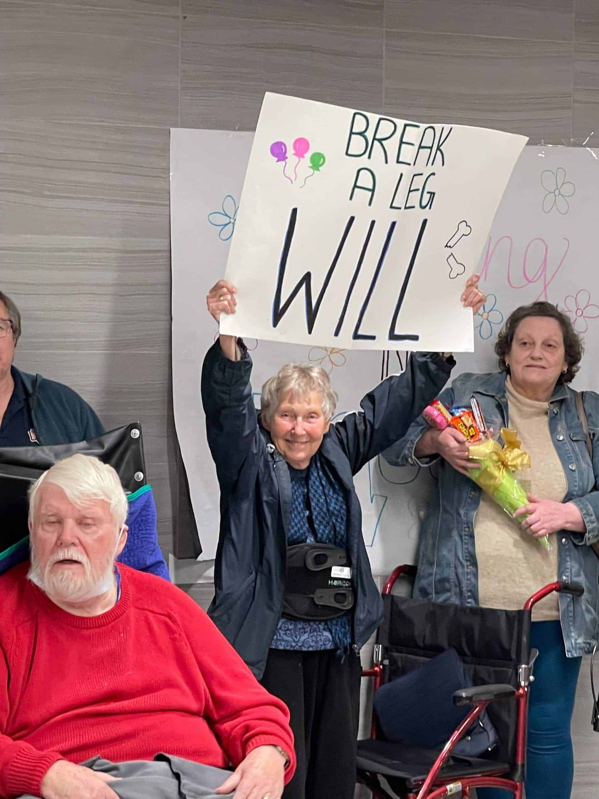 elderly residents holding signs for support