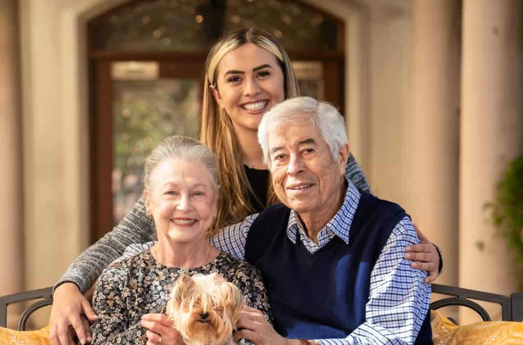 elderly couple with yorkie dog