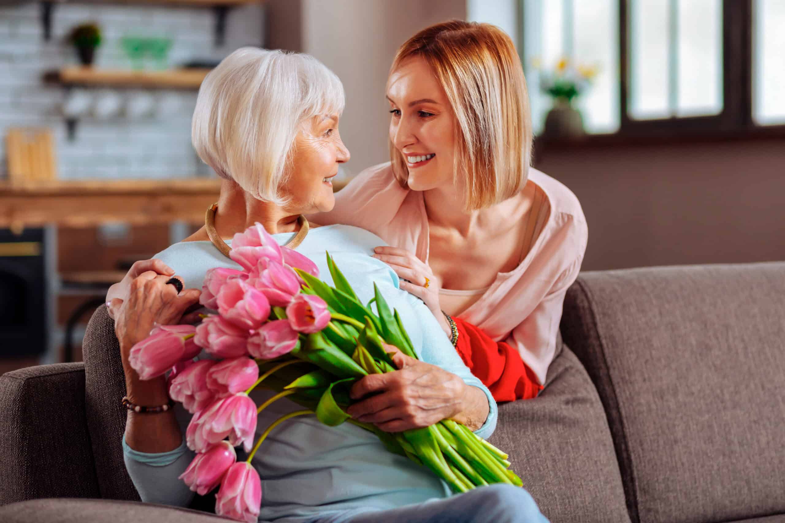 mother and daughter getting flowers special occasion