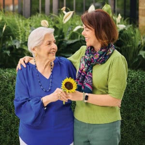 mother daughter sunflower happy
