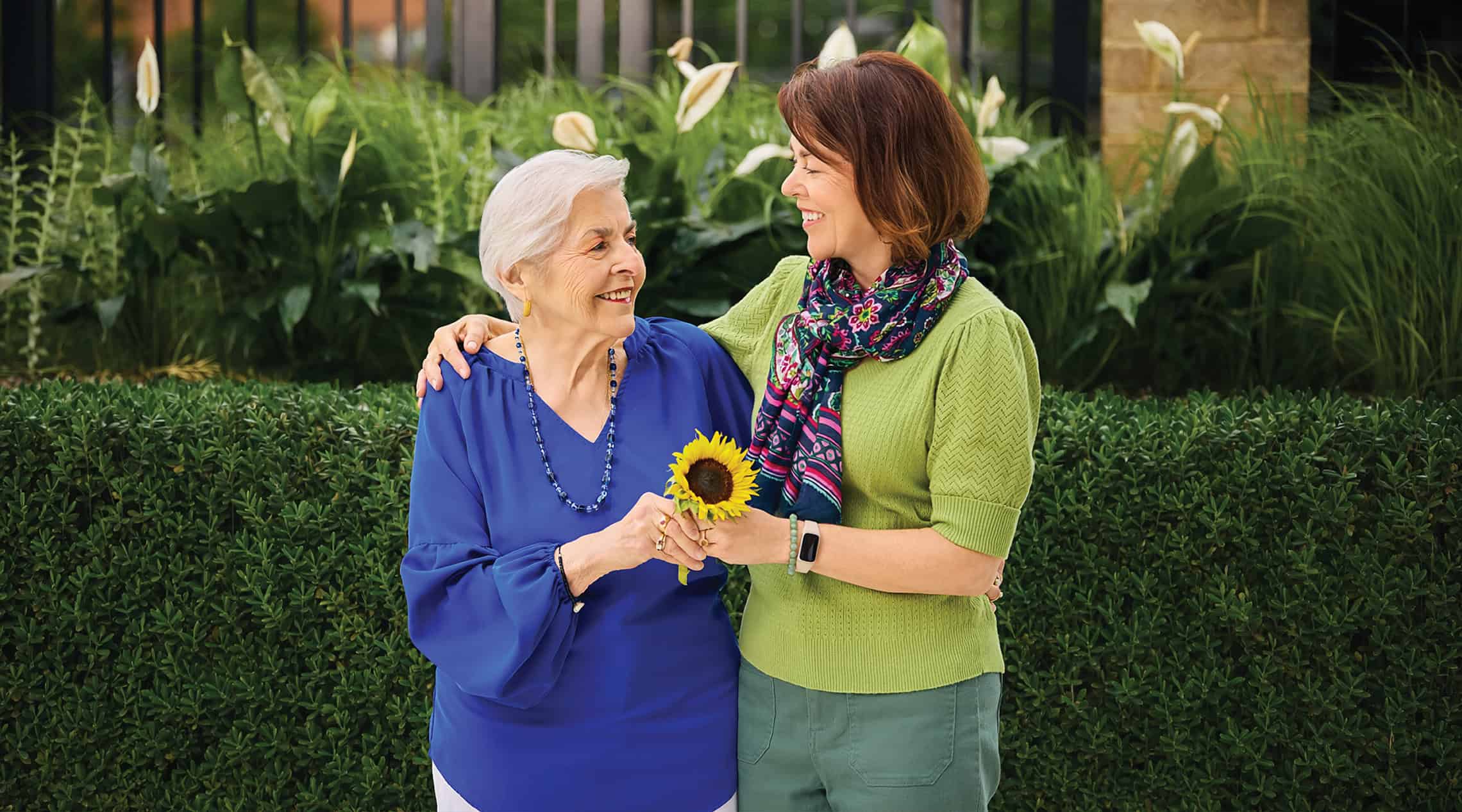 mother daughter sunflower happy